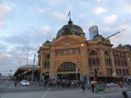 Front of the Flinders Street Railway Station at the crossing of Flinders Street and St. Kilda Road, at sunset
