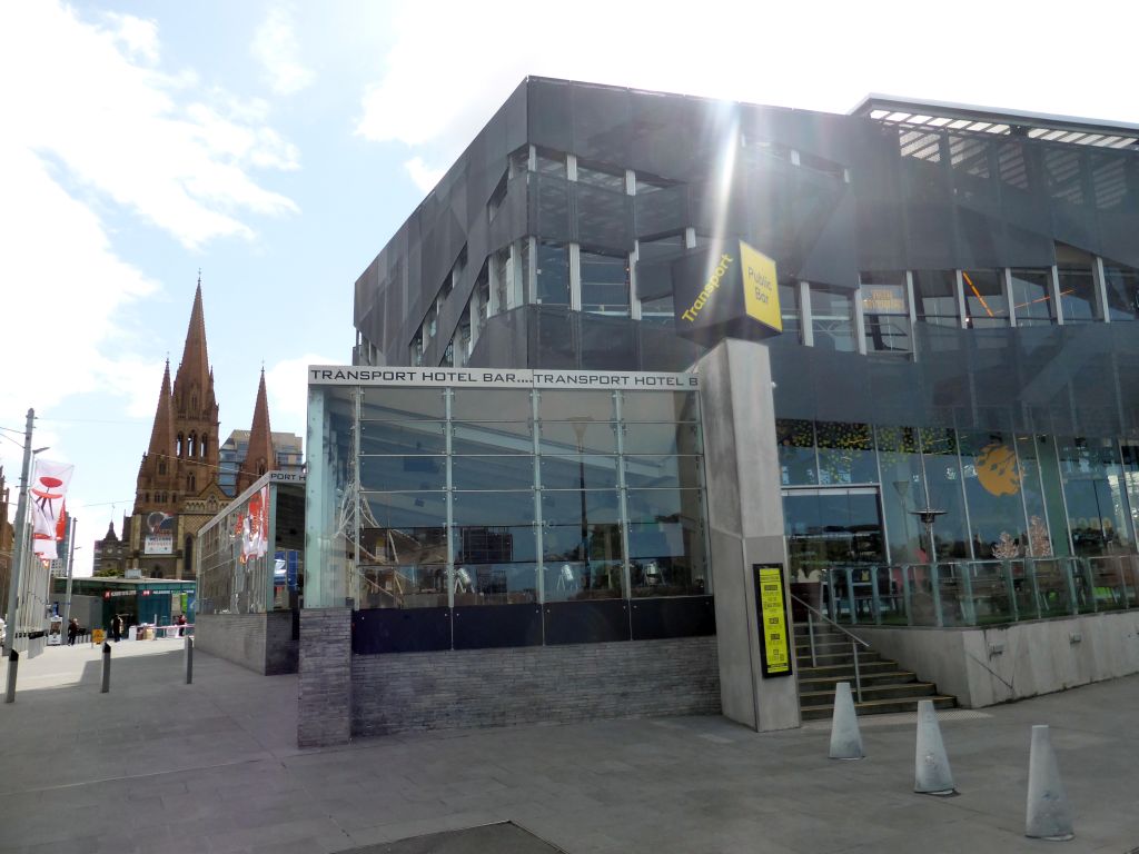 The Transport Hotel at St. Kilda Road, Federation Square and St. Paul`s Cathedral, viewed from the Princes Walk at the Birrarung Marr Park