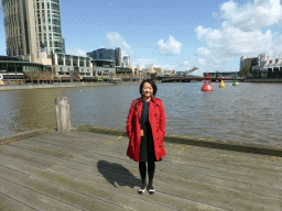 Miaomiao at Enterprize Park, with a view on the Kings Bridge over the Yarra River and the Crown Casino and Entertainment Complex