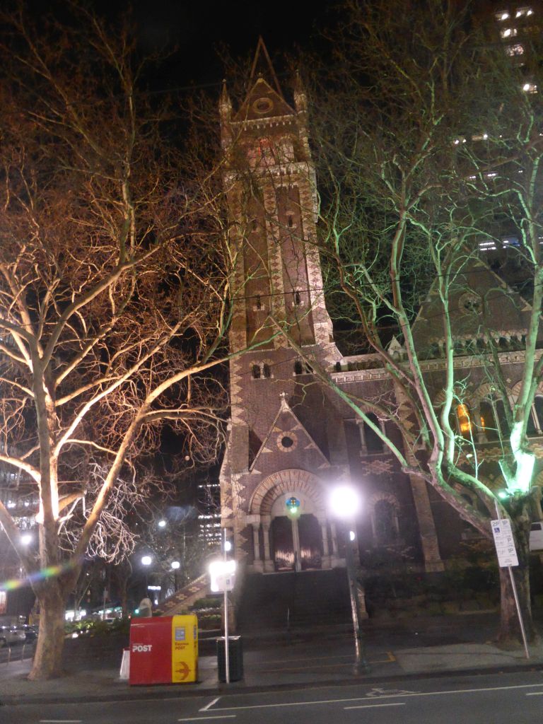 South side of St Michael`s Uniting Church at Collins Street, viewed from our tour bus from Phillip Island, by night