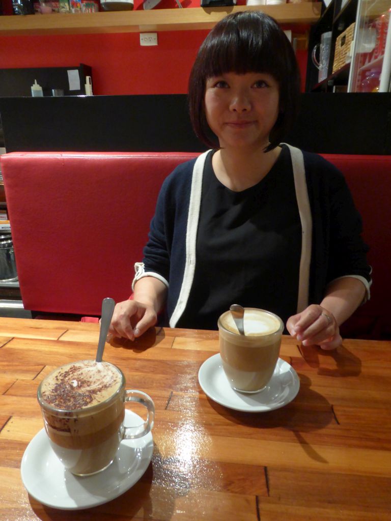 Miaomiao having coffee at the Aix Café at Centre Place