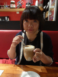 Miaomiao having coffee at the Aix Café at Centre Place