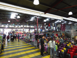 Stalls with suitcases, clothing and toys at the Queen Victoria Market