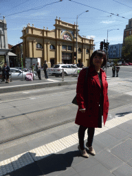 Miaomiao with the front of the Queen Victoria Market at the crossing of Elizabeth Street and Victoria Street