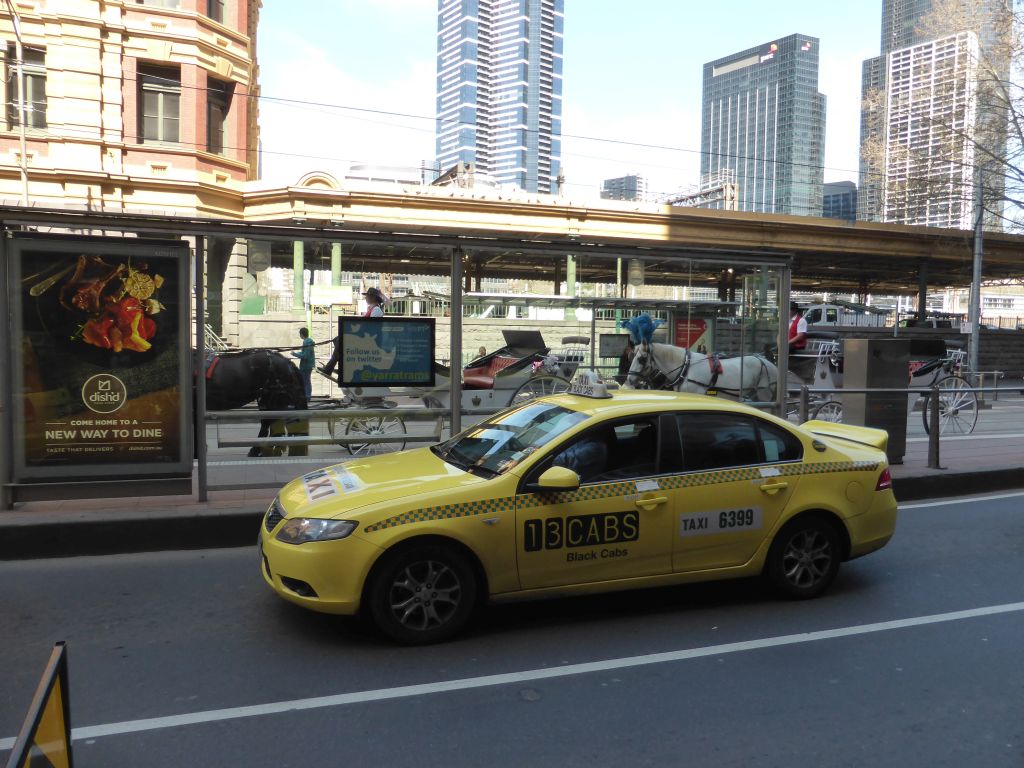 Elizabeth Street with horses and carriages