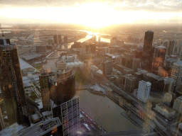 The west side of the city with the Prima Pearl Tower, the Crown Towers, the Melbourne Convention and Exhibition Centre, Batman`s Hill, Batman Park, the Sea Life Melbourne Aquarium and the Queens Bridge, the Kings Bridge, the Seafarers Bridge and the Charles Grimes Bridge over the Yarra River, viewed from the Skydeck 88 of the Eureka Tower