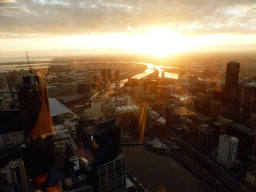 The west side of the city with the Prima Pearl Tower, the Crown Towers, the Melbourne Convention and Exhibition Centre, Batman`s Hill, Batman Park, the Sea Life Melbourne Aquarium and the Kings Bridge, the Seafarers Bridge and the Charles Grimes Bridge over the Yarra River, viewed from the Skydeck 88 of the Eureka Tower