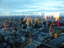 Skyscrapers at the city center, the Flinders Street Railway Station, St. Paul`s Cathedral and Federation Square with the Australian Centre for the Moving Image, viewed from the Skydeck 88 of the Eureka Tower