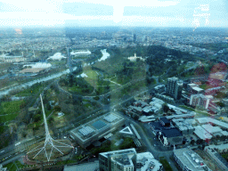 The Spire of the Arts Centre Melbourne, the National Gallery of Victoria, the Queen Victoria Gardens, the Kings Domain with the Government House, the Melbourne Cricket Ground, the Rod Laver Arena, Melbourne Park, the Hisense Arena, the AAMI Park and the Yarra River, viewed from the Skydeck 88 of the Eureka Tower