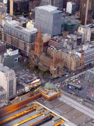 St. Paul`s Cathedral and the Flinders Street Railway Station, viewed from the Skydeck 88 of the Eureka Tower, at sunset