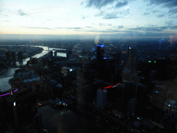 The city center with Batman`s Hill, Batman Park, the Sea Life Melbourne Aquarium, the Rialto Towers and the Kings Bridge, the Seafarers Bridge, the Charles Grimes Bridge and the Bolte Bridge over the Yarra River, viewed from the Skydeck 88 of the Eureka Tower, at sunset