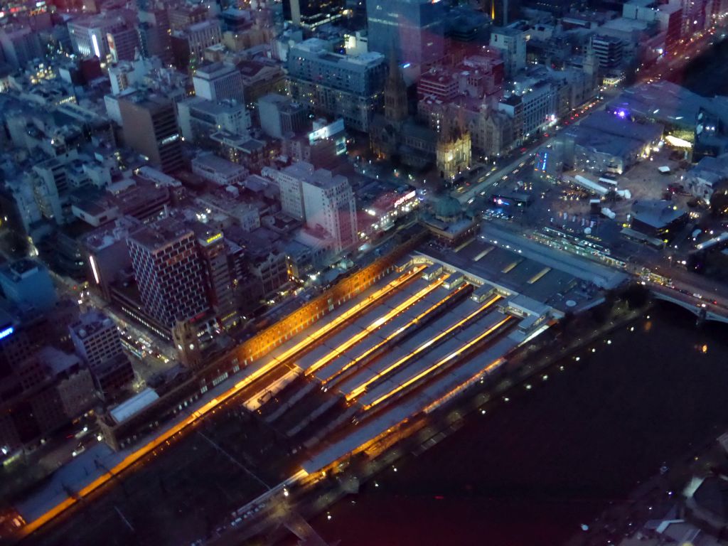 St. Paul`s Cathedral, the Flinders Street Railway Station and the Yarra River, viewed from the Skydeck 88 of the Eureka Tower, at sunset