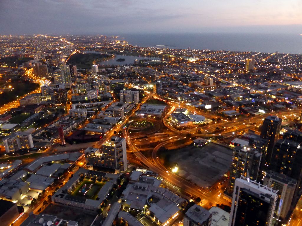 The south side of the city with the Albert Park Lake, Gunn Island and Hobsons Bay, viewed from the Skydeck 88 of the Eureka Tower, at sunset