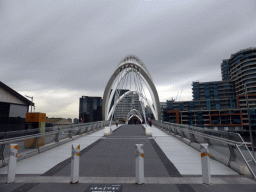 The Seafarers Bridge over the Yarra River and the front of the WTC Wharf Melbourne building, viewed from the South Wharf Promenade