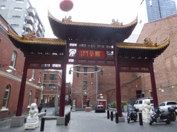East side of Cohen Place with a gate and a statue of Dr. Sun Yat-Sen