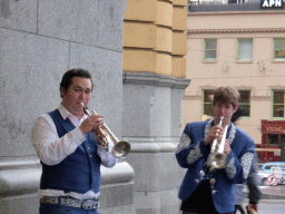 Street musicians in front of the Flinders Street Railway Station at the crossing of Flinders Street and St. Kilda Road