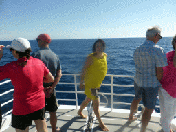 Miaomiao on the deck of our Seastar Cruises tour boat coming from Cairns