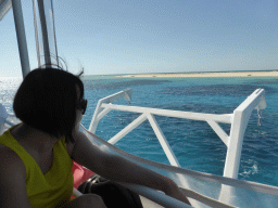 Miaomiao at our Seastar Cruises tour boat, with a view on Michaelmas Cay
