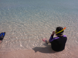 Miaomiao with snorkeling equipment and fish at Michaelmas Cay