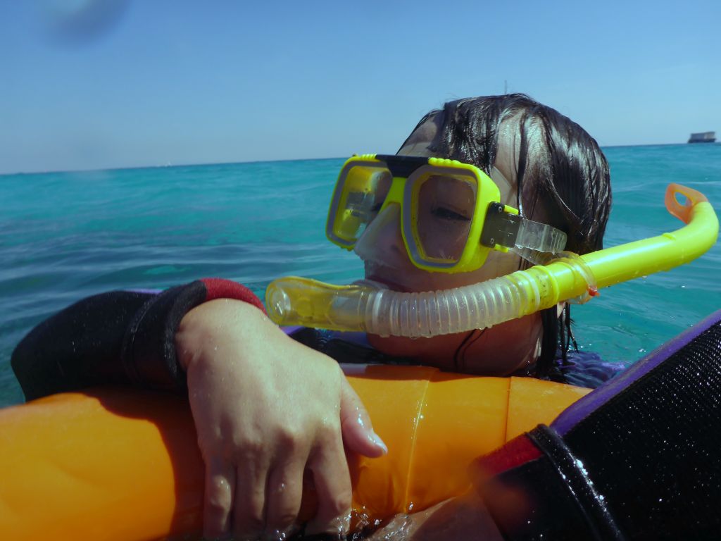 Miaomiao with snorkeling equipment in the water