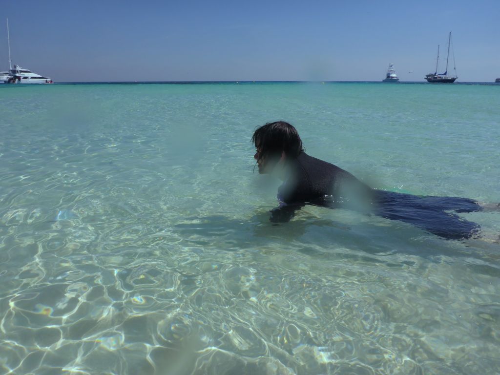 Miaomiao in the water in front of our Seastar Cruises tour boat