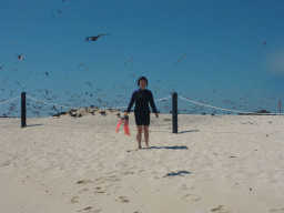 Miaomiao with snorkeling equipment and birds at Michaelmas Cay