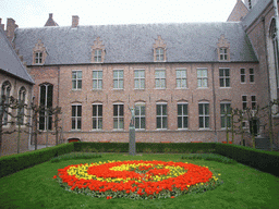 West side of the Abbey, with flowers and a statue