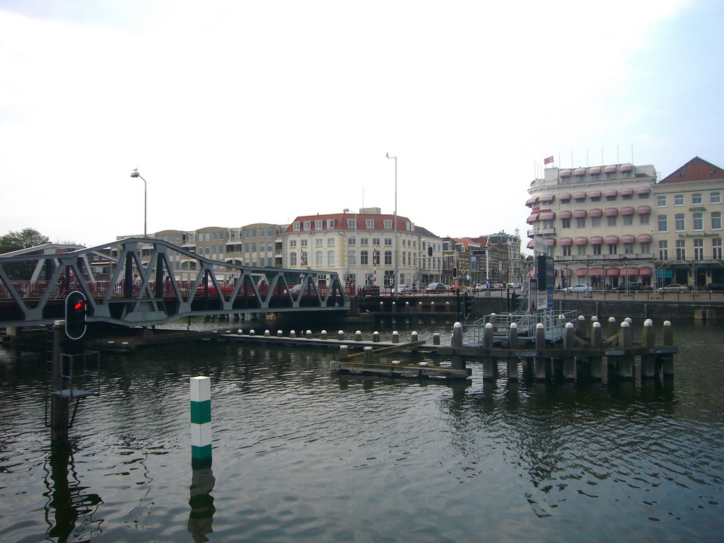 View from the Central Station on the Stationsstraat, a bridge over the Canal through Walcheren, and the Grand Hotel du Commerce