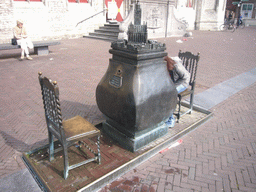 Miaomiao and a scale model of the City Hall of Middelburg, in front of the City Hall of Middelburg at the Markt square