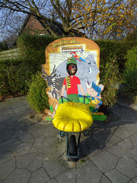 Max at a sign in front of the Dierenrijk zoo