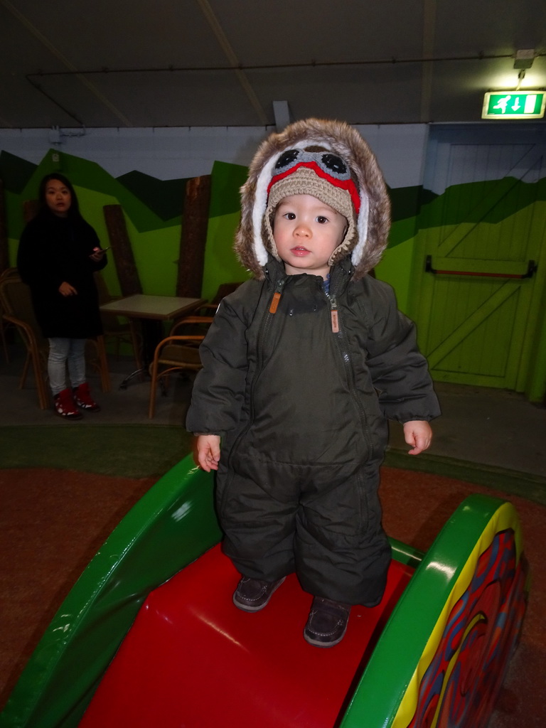 Max at the playground at the Indoor Apenkooien hall at the Dierenrijk zoo