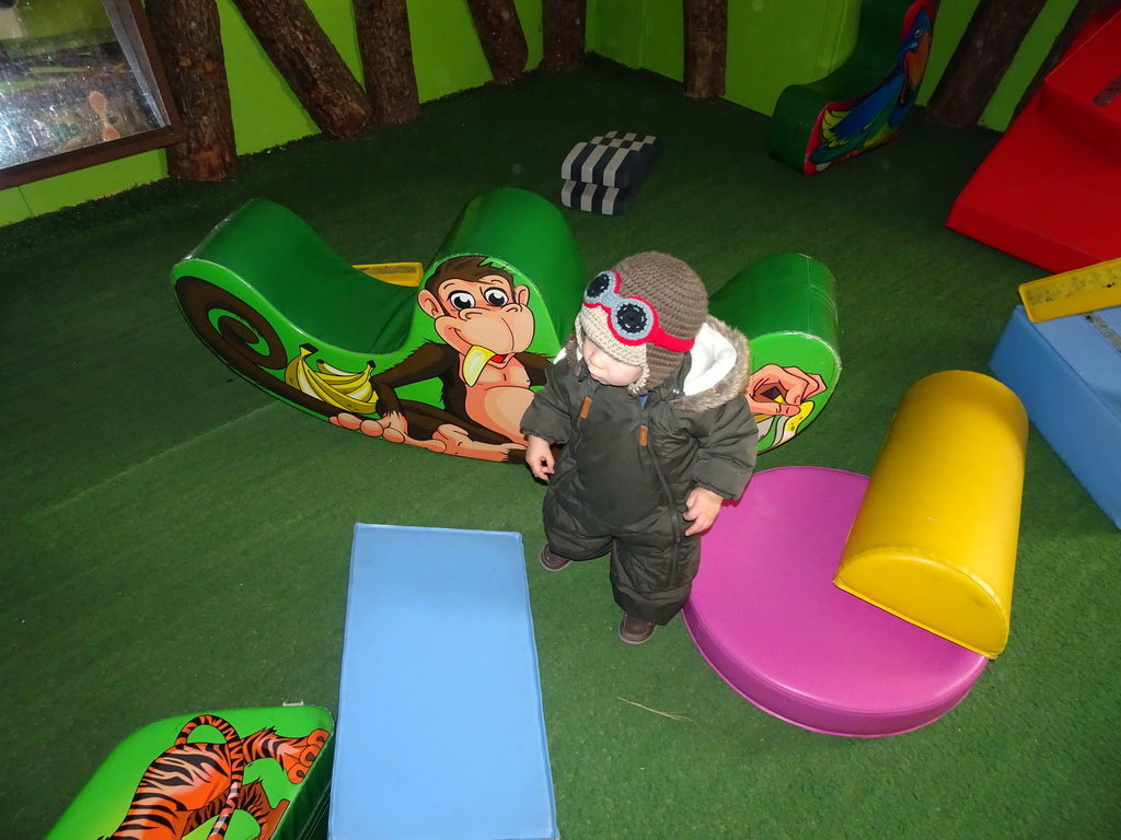 Max at the playground at the Indoor Apenkooien hall at the Dierenrijk zoo