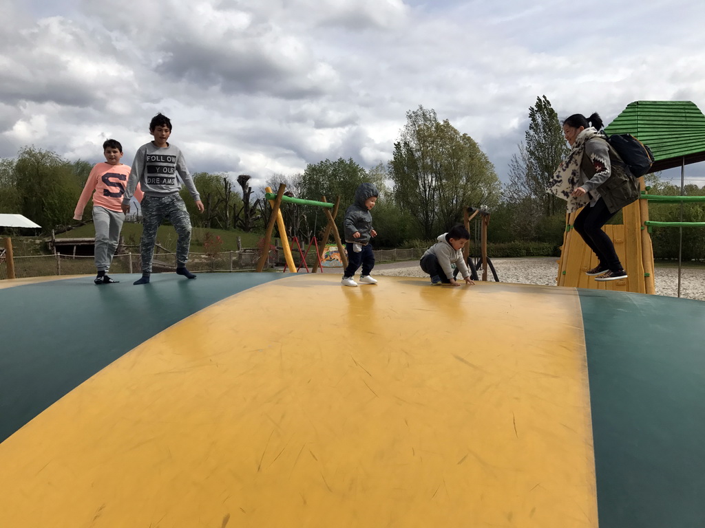 Max and his friend at the trampoline at the playground near Restaurant Smulrijk at the Dierenrijk zoo