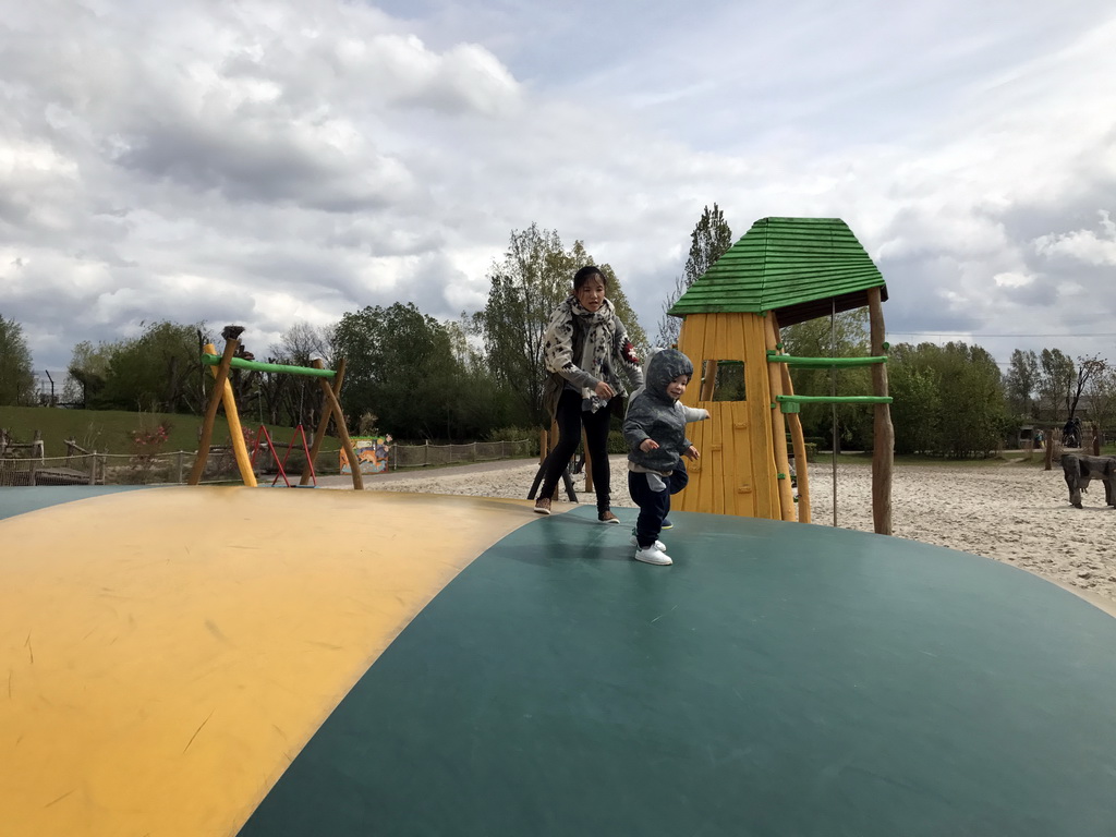 Max at the trampoline at the playground near Restaurant Smulrijk at the Dierenrijk zoo