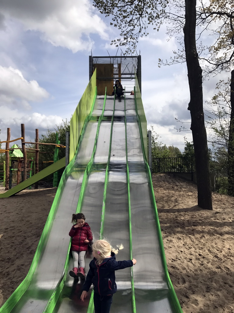 Miaomiao and Max on the slide at the playground near Restaurant Smulrijk at the Dierenrijk zoo