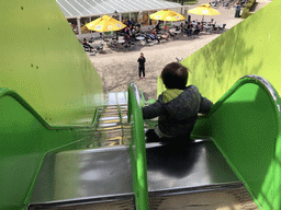 Max on the slide at the playground near Restaurant Smulrijk at the Dierenrijk zoo