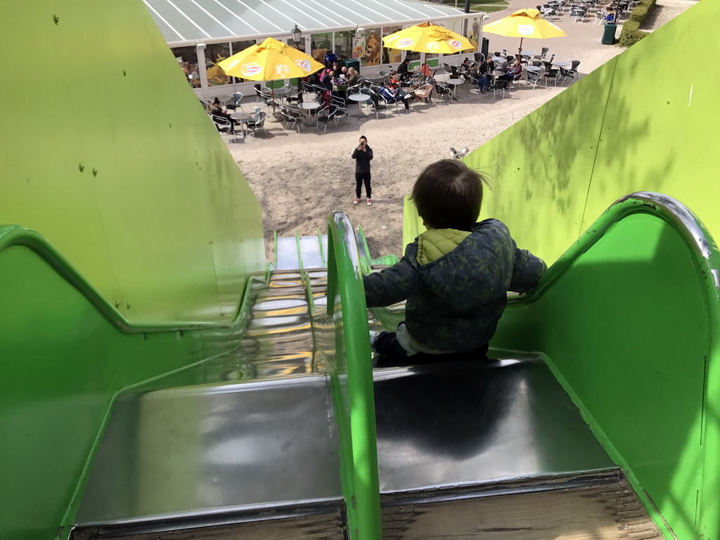 Max on the slide at the playground near Restaurant Smulrijk at the Dierenrijk zoo