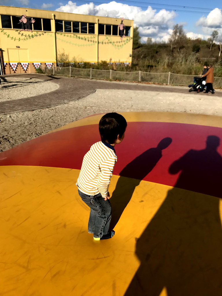 Max at the trampoline at the playground near Restaurant Smulrijk at the Dierenrijk zoo