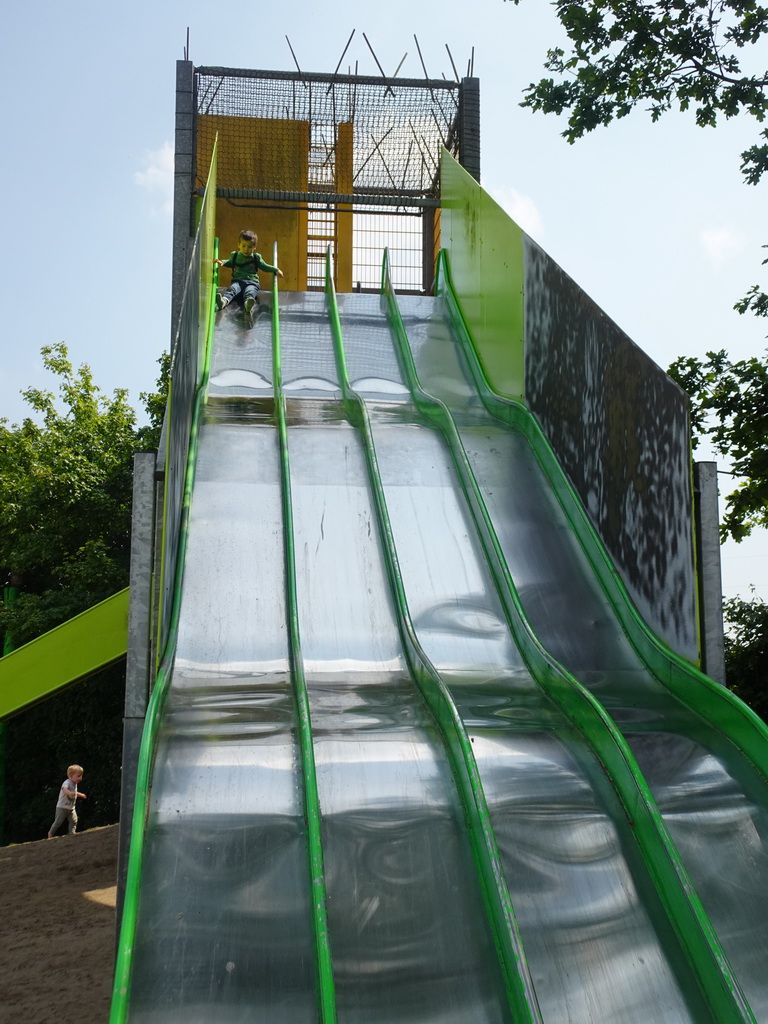 Max on a slide at the playground near Restaurant Smulrijk at the Dierenrijk zoo