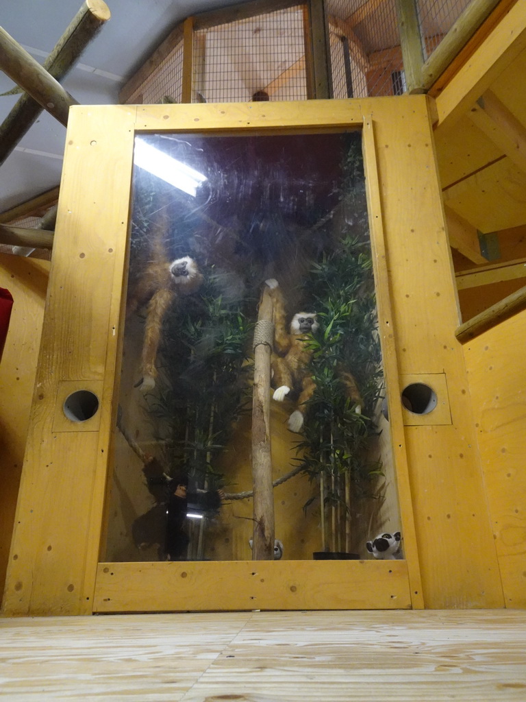 Stuffed monkeys at the playground at the Indoor Apenkooien hall at the Dierenrijk zoo