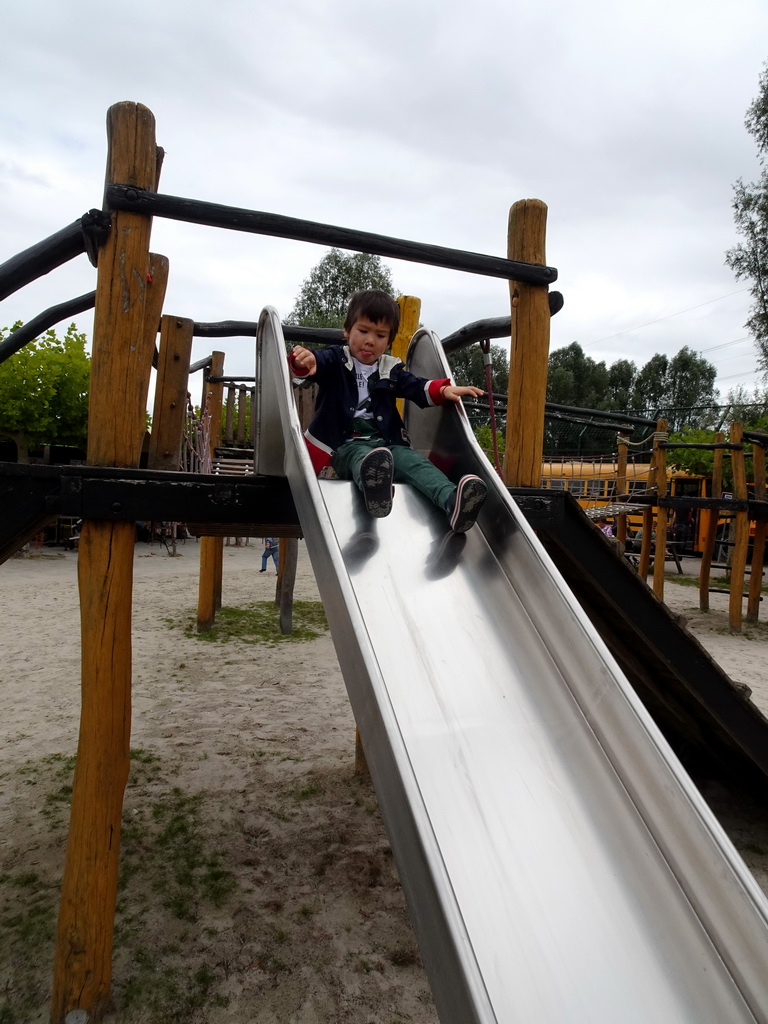 Max on a slide at the playground at the northeast side of the Dierenrijk zoo