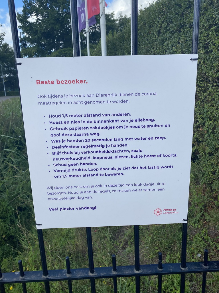 Sign about the COVID-19 rules at the entrance to the Dierenrijk zoo at the Heiderschoor street