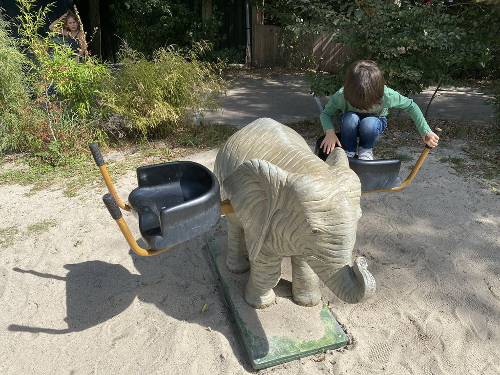 Max on a seesaw at the playground at the west side of the Dierenrijk zoo