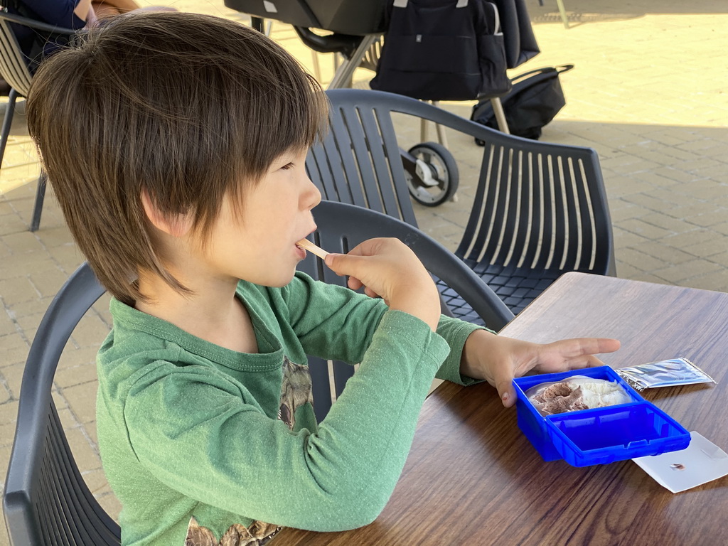 Max having icecream at the terrace near the Indian Rhinoceros enclosure at the Dierenrijk zoo