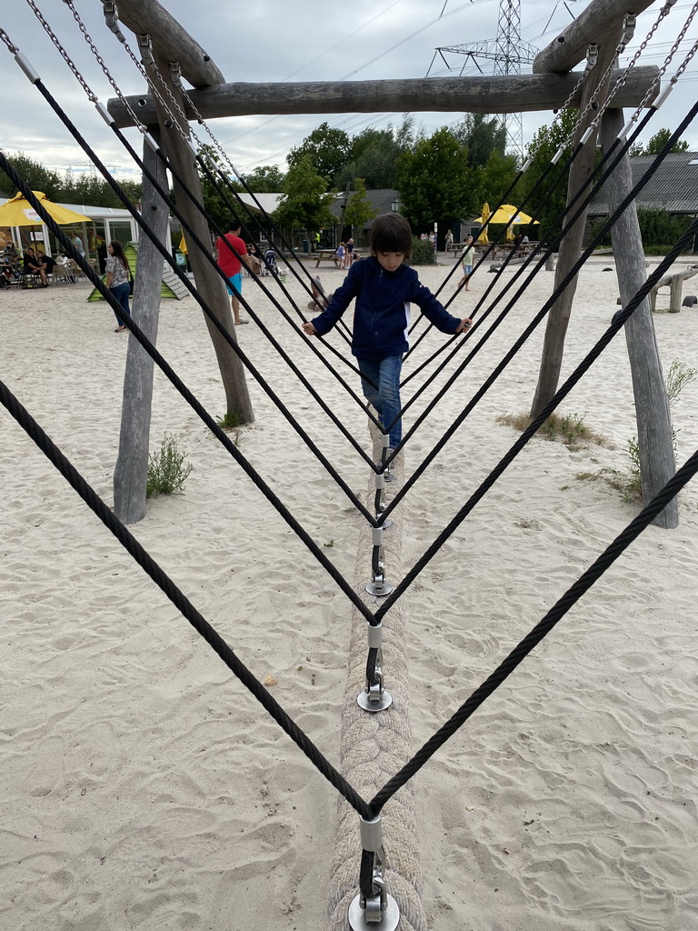 Max on a rope bridge at the playground near Restaurant Smulrijk at the Dierenrijk zoo