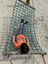 Max on a hammock at the playground near Restaurant Smulrijk at the Dierenrijk zoo