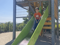 Max on a slide at the playground near Restaurant Smulrijk at the Dierenrijk zoo