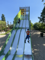 Max on a slide at the playground near Restaurant Smulrijk at the Dierenrijk zoo