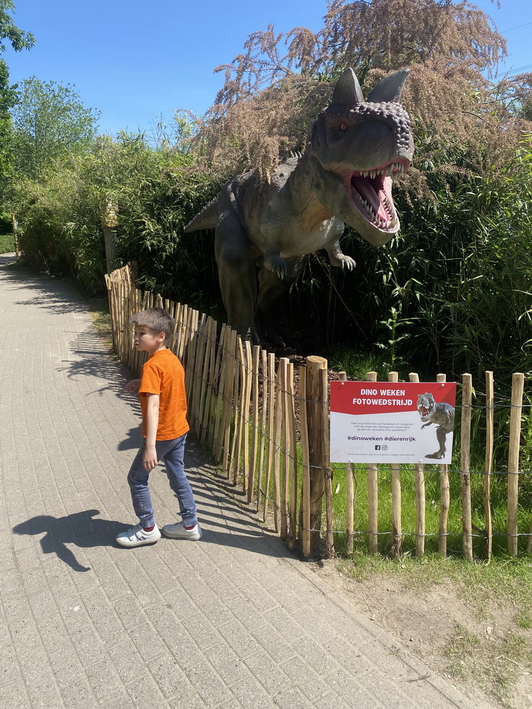 Max with an Albertosaurus statue at the Dierenrijk zoo