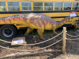 Plateosaurus statue in front of the school bus in front of the Polar Bear enclosure at the Dierenrijk zoo, with explanation
